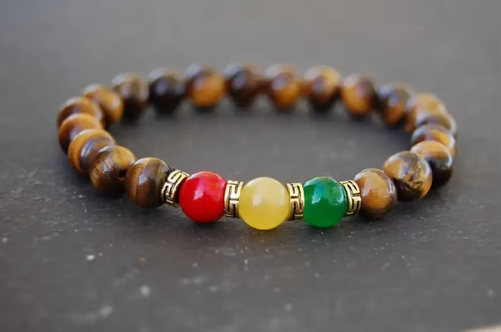 Beaded bracelet with colored beads on a dark surface