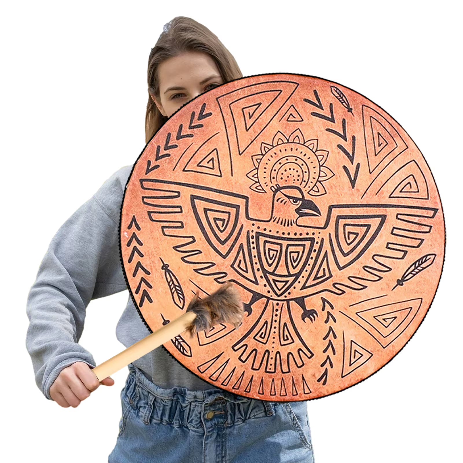 Person holding a large decorative shield with tribal patterns and a maul on a white background